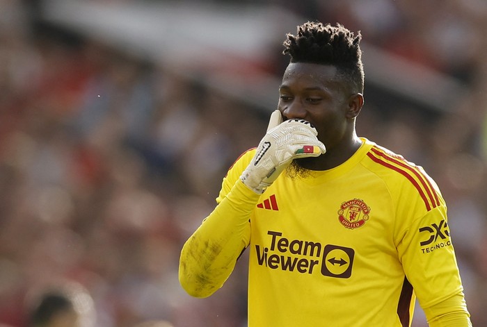 Soccer Football - Premier League - Manchester United v Brentford - Old Trafford, Manchester, Britain - October 7, 2023 Manchester Uniteds Andre Onana reacts after conceding their first goal, scored by Brentfords Mathias Jensen Action Images via Reuters/Jason Cairnduff NO USE WITH UNAUTHORIZED AUDIO, VIDEO, DATA, FIXTURE LISTS, CLUB/LEAGUE LOGOS OR LIVE SERVICES. ONLINE IN-MATCH USE LIMITED TO 45 IMAGES, NO VIDEO EMULATION. NO USE IN BETTING, GAMES OR SINGLE CLUB/LEAGUE/PLAYER PUBLICATIONS.