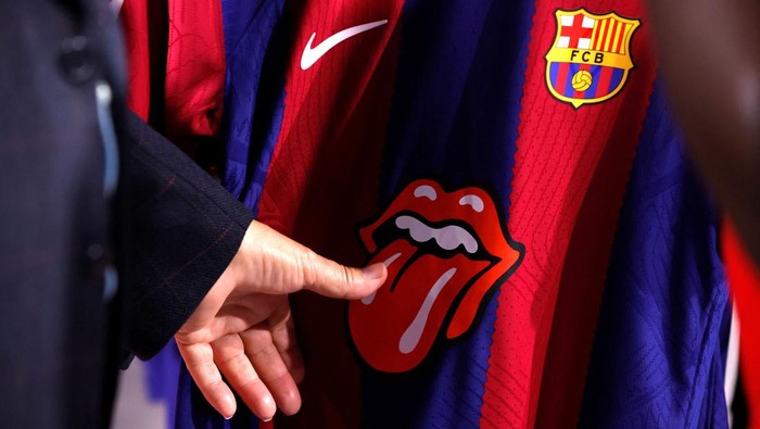 An FC Barcelona shirt featuring the Rolling Stones logo is seen for sale in the FC Barcelona Store in Barcelona, Spain, October 23, 2023. REUTERS/Albert Gea