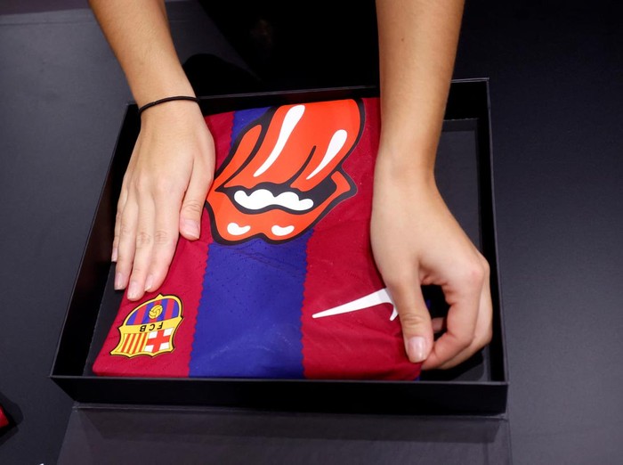 An FC Barcelona shirt featuring the Rolling Stones logo is seen for sale in the FC Barcelona Store in Barcelona, Spain, October 23, 2023. REUTERS/Albert Gea