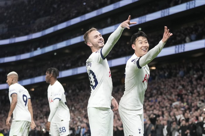 Tottenhams Son Heung-min, right, and Tottenhams James Maddison during the English Premier League soccer match between Tottenham Hotspur and Fulham at the Tottenham Hotspur Stadium in London, Monday, Oct. 23, 2023. (AP Photo/Kin Cheung)