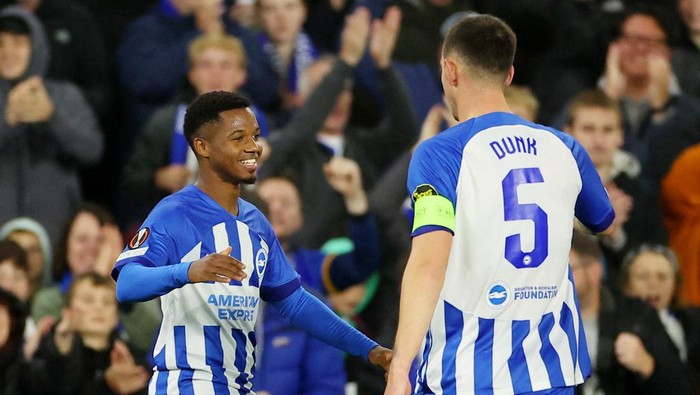Soccer Football - Europa League - Group B - Brighton & Hove Albion v Ajax Amsterdam - The American Express Community Stadium, Brighton, Britain - October 26, 2023 Brighton & Hove Albions Ansu Fati celebrates scoring their second goal with teammate Lewis Dunk REUTERS/Toby Melville