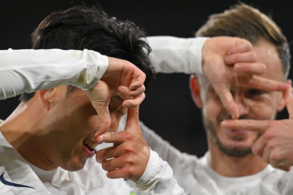 Tottenham Hotspur's South Korean striker #07 Son Heung-Min (L) celebrates scoring the team's second goal with Tottenham Hotspur's English midfielder #10 James Maddison during the English Premier League football match between Crystal Palace and Tottenham Hotspur at Selhurst Park in south London on October 27, 2023. (Photo by Glyn KIRK / AFP) / RESTRICTED TO EDITORIAL USE. No use with unauthorized audio, video, data, fixture lists, club/league logos or 'live' services. Online in-match use limited to 120 images. An additional 40 images may be used in extra time. No video emulation. Social media in-match use limited to 120 images. An additional 40 images may be used in extra time. No use in betting publications, games or single club/league/player publications. /