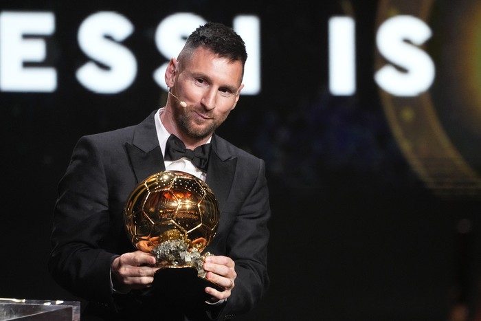 Inter Miamis and Argentinas national team player Lionel Messi receives the 2023 Ballon dOr trophy during the 67th Ballon dOr (Golden Ball) award ceremony at Theatre du Chatelet in Paris, France, Monday, Oct. 30, 2023. (AP Photo/Michel Euler)