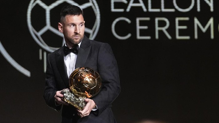 Inter Miami's and Argentina's national team player Lionel Messi receives the 2023 Ballon d'Or trophy during the 67th Ballon d'Or (Golden Ball) award ceremony at Theatre du Chatelet in Paris, France, Monday, Oct. 30, 2023. (AP Photo/Michel Euler)