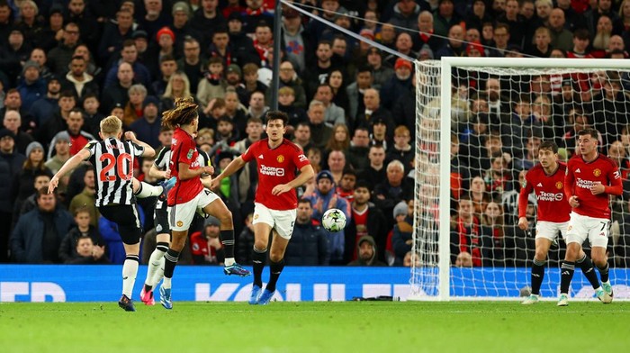 Soccer Football - Carabao Cup - Fourth Round - Manchester United v Newcastle United - Old Trafford, Manchester, Britain - November 1, 2023 Newcastle United's Lewis Hall scores their second goal REUTERS/Molly Darlington NO USE WITH UNAUTHORIZED AUDIO, VIDEO, DATA, FIXTURE LISTS, CLUB/LEAGUE LOGOS OR 'LIVE' SERVICES. ONLINE IN-MATCH USE LIMITED TO 45 IMAGES, NO VIDEO EMULATION. NO USE IN BETTING, GAMES OR SINGLE CLUB/LEAGUE/PLAYER PUBLICATIONS.