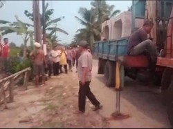 Jalan Penghubung Batu Bara-Sergai yang Putus Total gegara Banjir Diperbaiki