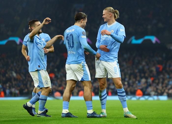 Soccer Football - Champions League - Group G - Manchester City v BSC Young Boys - Etihad Stadium, Manchester, Britain - November 7, 2023 Manchester Citys Erling Braut Haaland celebrates scoring their third goal with Manchester Citys Jack Grealish REUTERS/Molly Darlington