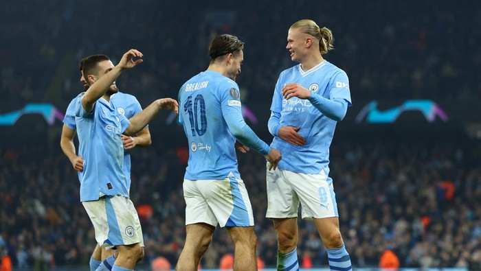 Soccer Football - Champions League - Group G - Manchester City v BSC Young Boys - Etihad Stadium, Manchester, Britain - November 7, 2023 Manchester Citys Erling Braut Haaland celebrates scoring their third goal with Manchester Citys Jack Grealish REUTERS/Molly Darlington