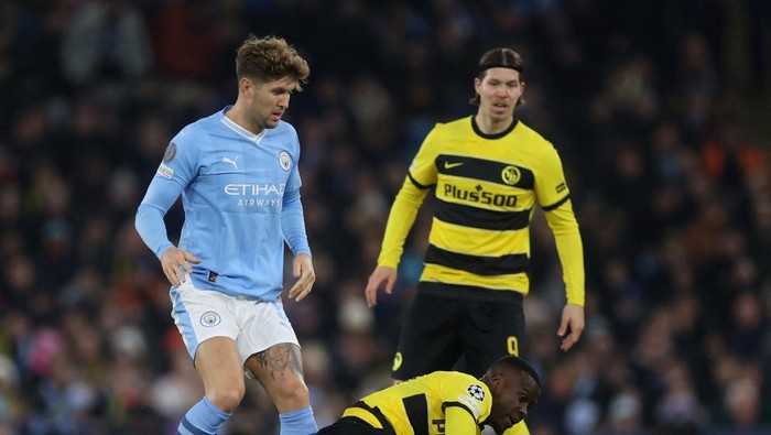 Soccer Football - Champions League - Group G - Manchester City v BSC Young Boys - Etihad Stadium, Manchester, Britain - November 7, 2023 Manchester Citys John Stones in action with BSC Young Boys Cheikh Niasse Action Images via Reuters/Lee Smith