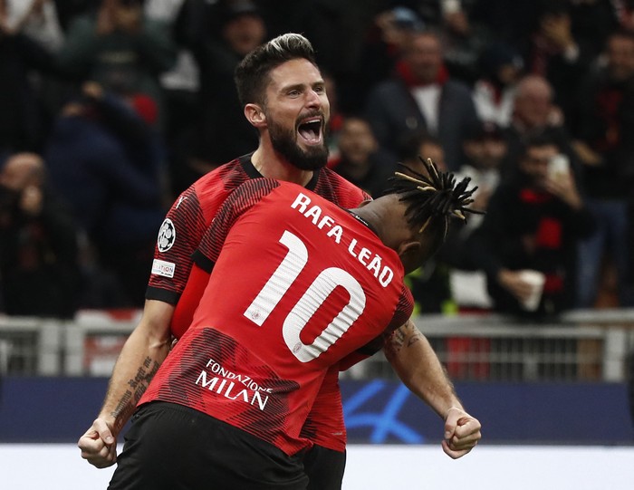Soccer Football - Champions League - Group F - AC Milan v Paris St Germain - San Siro, Milan, Italy - November 7, 2023 AC Milans Olivier Giroud celebrates scoring their second goal with Rafael Leao REUTERS/Alessandro Garofalo