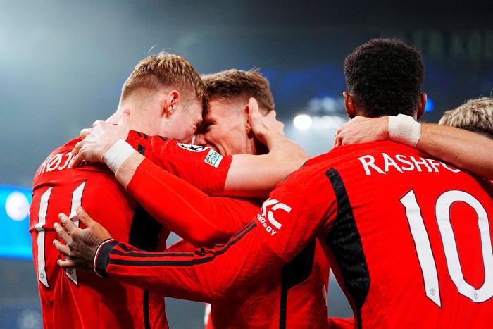 Soccer Football - Champions League - Group A - FC Copenhagen v Manchester United - Telia Parken, Copenhagen, Denmark - November 8, 2023  Manchester Uniteds Rasmus Hojlund celebrates scoring their first goal with Scott McTominay and Marcus Rashford   Liselotte Sabroe/Ritzau Scanpix via REUTERS        ATTENTION EDITORS - THIS IMAGE WAS PROVIDED BY A THIRD PARTY. DENMARK OUT. NO COMMERCIAL OR EDITORIAL SALES IN DENMARK.