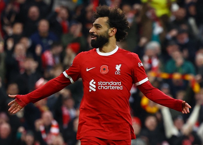 Soccer Football - Premier League - Liverpool v Brentford - Anfield, Liverpool, Britain - November 12, 2023 Liverpool's Mohamed Salah celebrates scoring their first goal REUTERS/Molly Darlington NO USE WITH UNAUTHORIZED AUDIO, VIDEO, DATA, FIXTURE LISTS, CLUB/LEAGUE LOGOS OR 'LIVE' SERVICES. ONLINE IN-MATCH USE LIMITED TO 45 IMAGES, NO VIDEO EMULATION. NO USE IN BETTING, GAMES OR SINGLE CLUB/LEAGUE/PLAYER PUBLICATIONS.