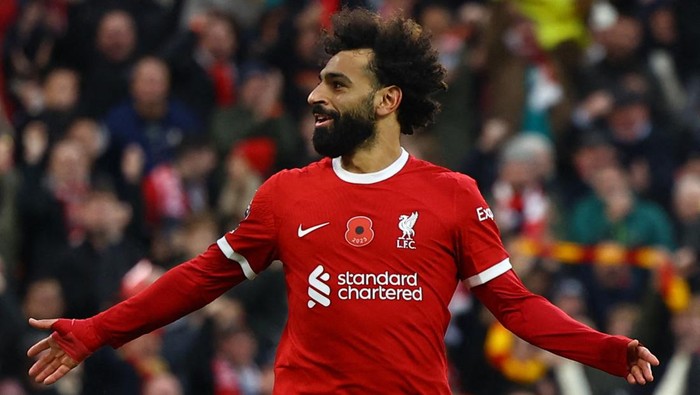 Soccer Football - Premier League - Liverpool v Brentford - Anfield, Liverpool, Britain - November 12, 2023 Liverpools Mohamed Salah celebrates scoring their first goal REUTERS/Molly Darlington NO USE WITH UNAUTHORIZED AUDIO, VIDEO, DATA, FIXTURE LISTS, CLUB/LEAGUE LOGOS OR LIVE SERVICES. ONLINE IN-MATCH USE LIMITED TO 45 IMAGES, NO VIDEO EMULATION. NO USE IN BETTING, GAMES OR SINGLE CLUB/LEAGUE/PLAYER PUBLICATIONS.