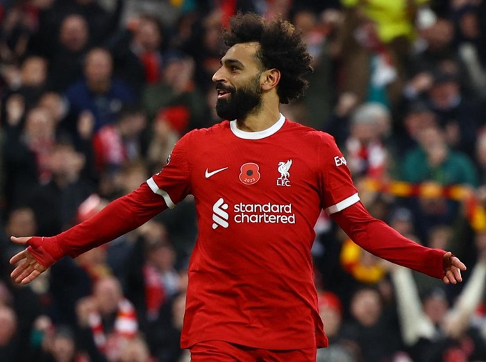 Soccer Football - Premier League - Liverpool v Brentford - Anfield, Liverpool, Britain - November 12, 2023 Liverpool's Mohamed Salah celebrates scoring their first goal REUTERS/Molly Darlington NO USE WITH UNAUTHORIZED AUDIO, VIDEO, DATA, FIXTURE LISTS, CLUB/LEAGUE LOGOS OR 'LIVE' SERVICES. ONLINE IN-MATCH USE LIMITED TO 45 IMAGES, NO VIDEO EMULATION. NO USE IN BETTING, GAMES OR SINGLE CLUB/LEAGUE/PLAYER PUBLICATIONS.