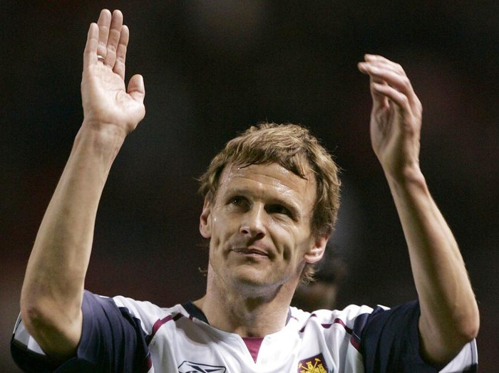 **  FILE  **  Teddy Sheringham of West Ham and formerly of Manchester United applauds the crowd after the teams' English Premier League soccer match at Old Trafford Stadium, Manchester, England, in this Wednesday March 29, 2006 file photo.  Teddy Sheringham turns 40 on Sunday, and 35,000 fans at West Ham will help him celebrate. The former England striker, who helped Manchester United win the Champions League seven years ago, will become the second oldest outfield player in a Premier League game when he takes the field against Charlton at West Ham's Upton Park. (AP Photo/Jon Super)  ** NO INTERNET/MOBILE USAGE WITHOUT FAPL LICENSE - SEE IPTC SPECIAL INSTRUCTIONS FIELD FOR DETAILS **