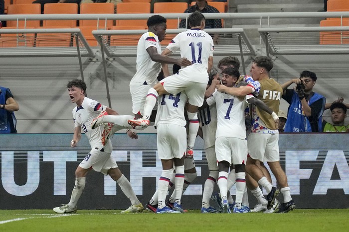 United States players celebrate after scoring a goal during their FIFA U-17 World Cup Group E soccer match against South Korea at Jakarta International Stadium in Jakarta, Indonesia, Sunday, Nov. 12, 2023. (AP Photo/Dita Alangkara)