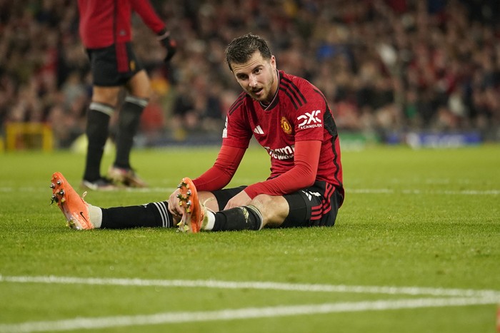 Mason Mount Manchester United's Mason Mount sits on the field during the Champions League group A soccer match between Manchester United and Galatasaray at the Old Trafford stadium in Manchester, England, Tuesday, Oct. 3, 2023. (AP Photo/Dave Thompson)