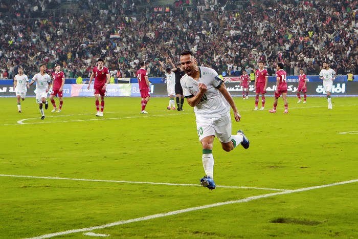 Iraqs Osama Rashid celebrates scoring his teams third goal during the 2026 FIFA World Cup AFC qualifiers football match between Iraq and Indonesia at the Basra International Stadium, in Basra, Iraq, Thursday, Nov.16, 2023. (AP Photo/Nabil al-Jourani)
