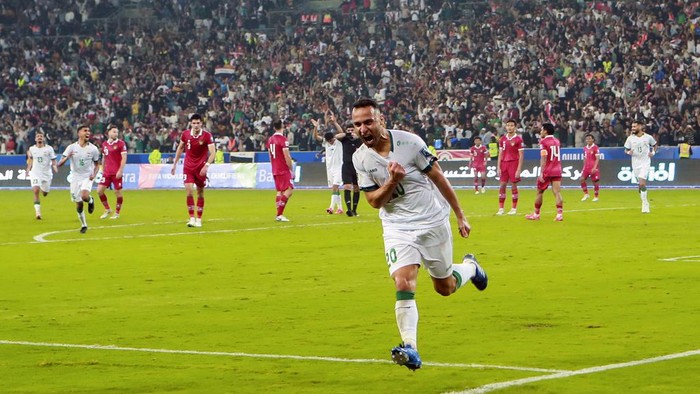 Irak vs Indonesia Iraq's Osama Rashid celebrates scoring his team's third goal during the 2026 FIFA World Cup AFC qualifiers football match between Iraq and Indonesia at the Basra International Stadium, in Basra, Iraq, Thursday, Nov.16, 2023. (AP Photo/Nabil al-Jourani)