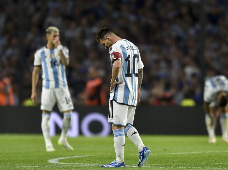 Argentina's Lionel Messi reacts during a qualifying soccer match for the FIFA World Cup 2026 against Uruguay at La Bombonera stadium in Buenos Aires, Argentina, Thursday, Nov. 16, 2023. (AP Photo/Gustavo Garello)
