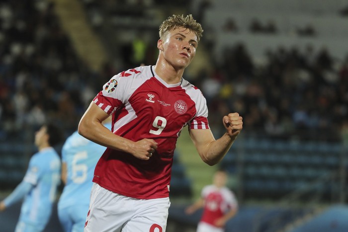 Denmarks Rasmus Hojlund celebrates after scoring his sides opening goal during the Euro 2024 group H qualifying soccer match between San Marino and Denmark at the San Marino Stadium in Serravalle, San Marino, Tuesday, Oct. 17, 2023. (AP Photo/Felice Calabro)