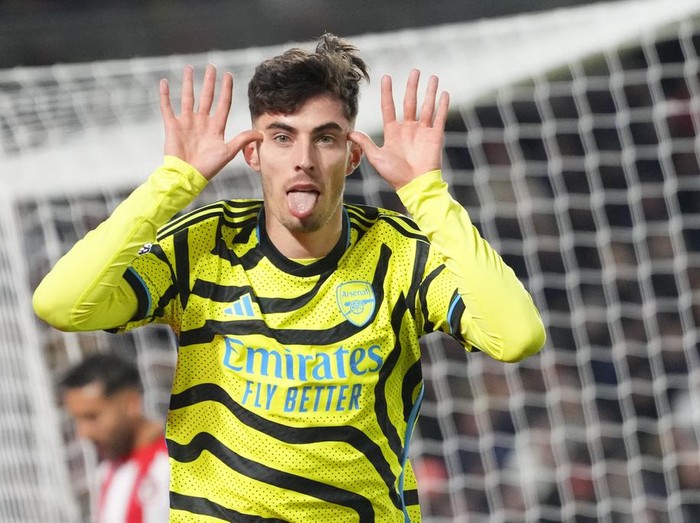 Arsenal's Kai Havertz celebrates after scoring his side's opening goal during the English Premier League soccer match between Brentford and Arsenal at the Gtech Community stadium in London, Saturday, Nov. 25, 2023. (AP Photo/Kirsty Wigglesworth)
