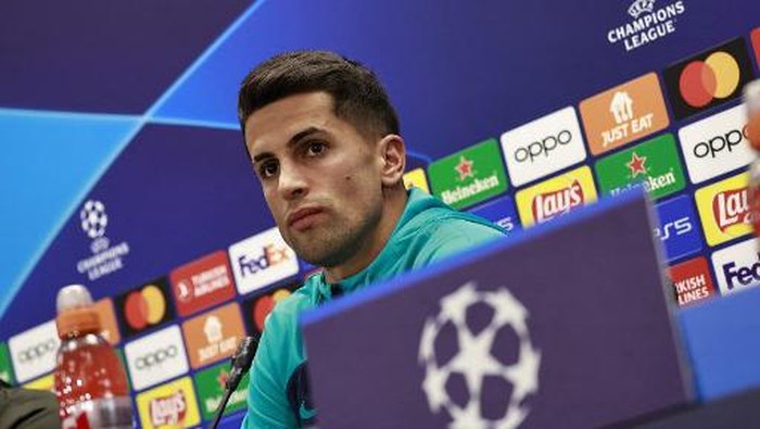 Barcelonas Portuguese defender #02 Joao Cancelo addresses a press conference in Barcelona on November 27, 2023, on the eve of the UEFA Champions League 1st round group H football match against FC Porto. (Photo by JOSE JORDAN / AFP)