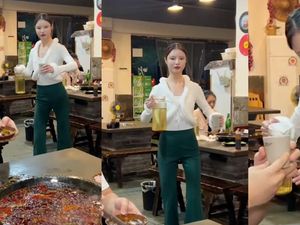 Pelayan Restoran di China Ini Pura-pura Jadi Robot Saat Layani Pembeli