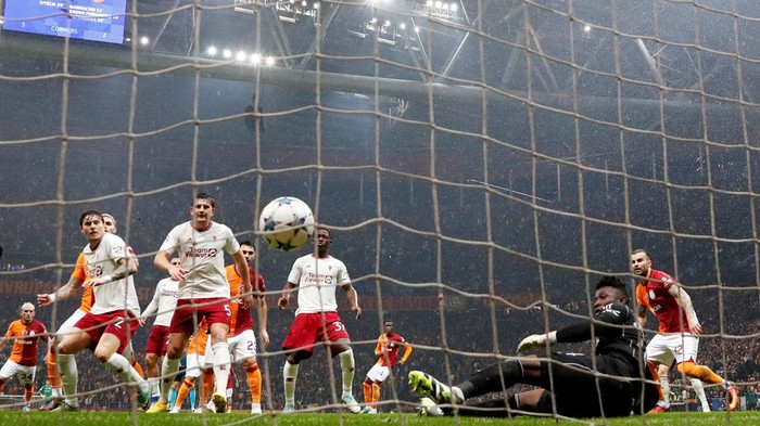 Soccer Football - Champions League - Group A - Galatasaray v Manchester United - RAMS Park, Istanbul, Turkey - November 29, 2023 Galatasarays Hakim Ziyech scores their second goal past Manchester Uniteds Andre Onana REUTERS/Murad Sezer     TPX IMAGES OF THE DAY