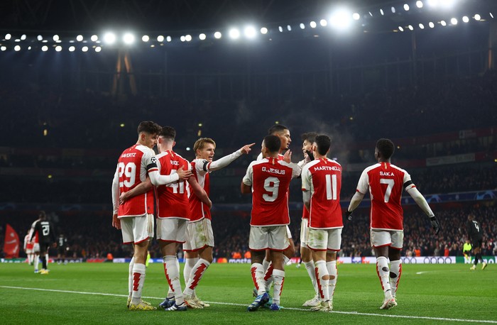 Soccer Football - Champions League - Group B - Arsenal v RC Lens - Emirates Stadium, London, Britain - November 29, 2023 Arsenal's Martin Odegaard celebrates scoring their fifth goal with teammates Action Images via Reuters/Matthew Childs