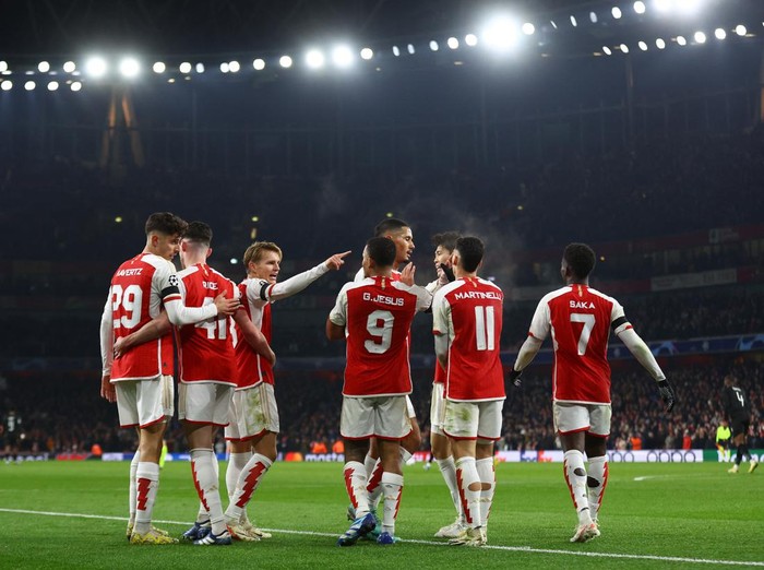 Soccer Football - Champions League - Group B - Arsenal v RC Lens - Emirates Stadium, London, Britain - November 29, 2023 Arsenal's Martin Odegaard celebrates scoring their fifth goal with teammates Action Images via Reuters/Matthew Childs