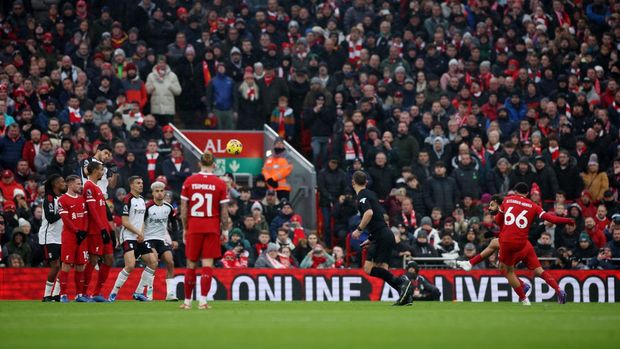 Soccer Football - Premier League - Liverpool v Fulham - Anfield, Liverpool, Britain - December 3, 2023 Liverpool's Trent Alexander-Arnold scores their first goal REUTERS/Phil Noble NO USE WITH UNAUTHORIZED AUDIO, VIDEO, DATA, FIXTURE LISTS, CLUB/LEAGUE LOGOS OR 'LIVE' SERVICES. ONLINE IN-MATCH USE LIMITED TO 45 IMAGES, NO VIDEO EMULATION. NO USE IN BETTING, GAMES OR SINGLE CLUB/LEAGUE/PLAYER PUBLICATIONS.