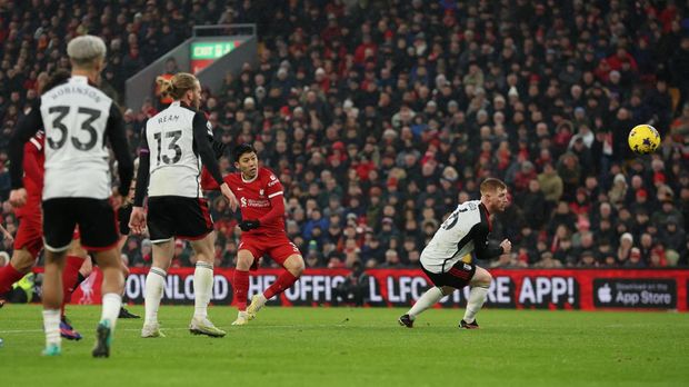 Soccer Football - Premier League - Liverpool v Fulham - Anfield, Liverpool, Britain - December 3, 2023 Liverpool's Wataru Endo scores their third goal REUTERS/Phil Noble NO USE WITH UNAUTHORIZED AUDIO, VIDEO, DATA, FIXTURE LISTS, CLUB/LEAGUE LOGOS OR 'LIVE' SERVICES. ONLINE IN-MATCH USE LIMITED TO 45 IMAGES, NO VIDEO EMULATION. NO USE IN BETTING, GAMES OR SINGLE CLUB/LEAGUE/PLAYER PUBLICATIONS.