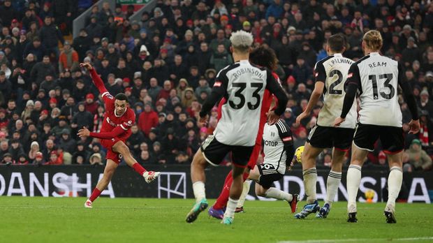 Soccer Football - Premier League - Liverpool v Fulham - Anfield, Liverpool, Britain - December 3, 2023 Liverpool's Trent Alexander-Arnold scores their fourth goal REUTERS/Phil Noble NO USE WITH UNAUTHORIZED AUDIO, VIDEO, DATA, FIXTURE LISTS, CLUB/LEAGUE LOGOS OR 'LIVE' SERVICES. ONLINE IN-MATCH USE LIMITED TO 45 IMAGES, NO VIDEO EMULATION. NO USE IN BETTING, GAMES OR SINGLE CLUB/LEAGUE/PLAYER PUBLICATIONS.
