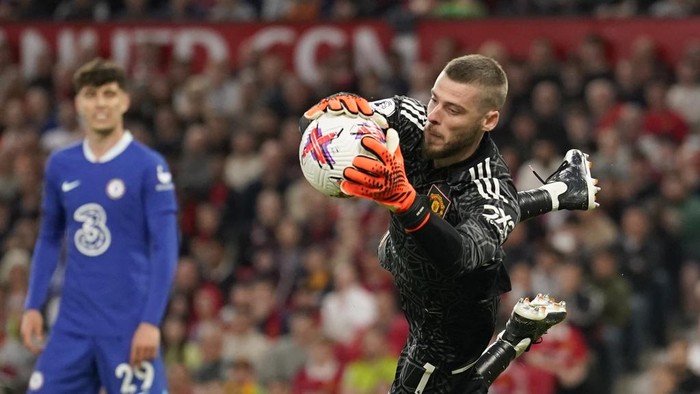 Davic de Gea Manchester United's goalkeeper David de Gea makes a save during the English Premier League soccer match between Manchester United and Chelsea at the Old Trafford stadium in Manchester, England, Thursday, May 25, 2023. (AP Photo/Dave Thompson)