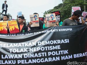 Aksi Peringatan Hari HAM dan Antikorupsi di Patung Kuda