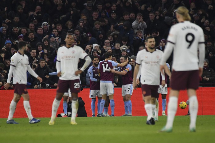 Britain Soccer Premier League Aston Villa's Leon Bailey celebrates with teammates after scoring during the English Premier League soccer match between Aston Villa and Manchester City at Villa Park in Birmingham, England, Wednesday, Dec. 6, 2023. (AP Photo/Rui Vieira)