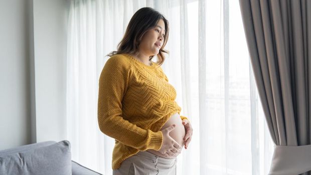 worried pregnant woman concerned and anxious woman in pregnancy overthinking worrying aboutÂ pregnancy problemÂ Pregnancy depression Mental health concept