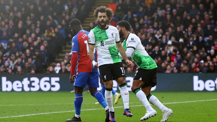 Soccer Football - Premier League - Crystal Palace v Liverpool - Selhurst Park, London, Britain - December 9, 2023 Liverpools Mohamed Salah celebrates scoring their first goal REUTERS/Hannah Mckay NO USE WITH UNAUTHORIZED AUDIO, VIDEO, DATA, FIXTURE LISTS, CLUB/LEAGUE LOGOS OR LIVE SERVICES. ONLINE IN-MATCH USE LIMITED TO 45 IMAGES, NO VIDEO EMULATION. NO USE IN BETTING, GAMES OR SINGLE CLUB/LEAGUE/PLAYER PUBLICATIONS.