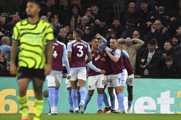 Aston Villa Aston Villa players celebrate after Aston Villa's John McGinn scored his side's opening goal during the English Premier League soccer match between Aston Villa and Arsenal at Villa Park in Birmingham, England, Saturday, Dec. 9, 2023. (AP Photo/Rui Vieira)