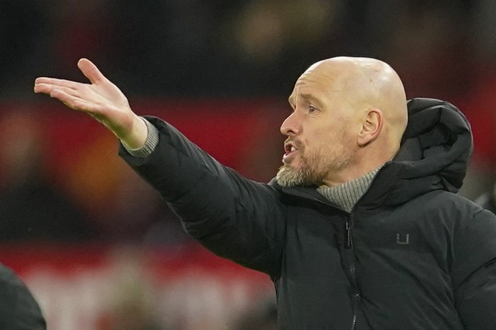 Manchester Uniteds head coach Erik ten Hag gives instructions to his players during the English Premier League soccer match between Manchester United and Chelsea at Old Trafford stadium in Manchester, England, Wednesday, Dec. 6, 2023. (AP Photo/Dave Thompson)
