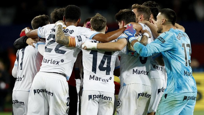 Soccer Football - LaLiga - FC Barcelona v Girona - Estadi Olimpic Lluis Companys, Barcelona, Spain - December 10, 2023 Girona players celebrate after the match REUTERS/Albert Gea