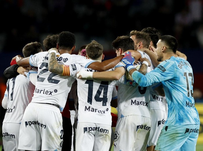 Soccer Football - LaLiga - FC Barcelona v Girona - Estadi Olimpic Lluis Companys, Barcelona, Spain - December 10, 2023 Girona players celebrate after the match REUTERS/Albert Gea