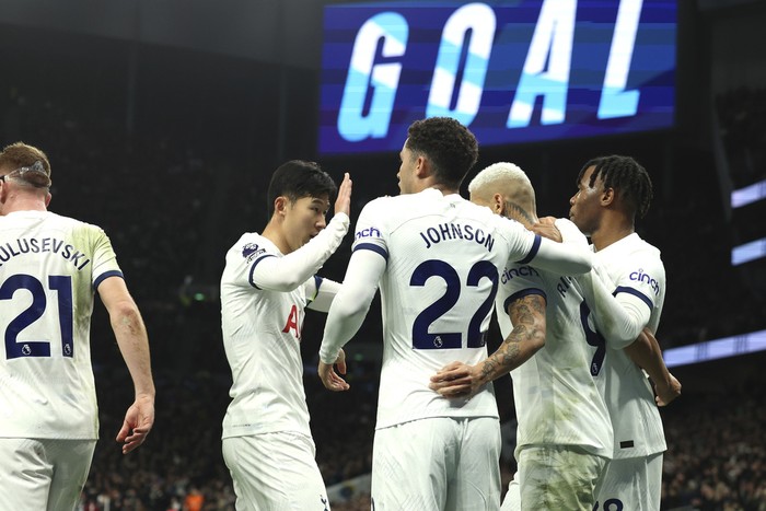 Tottenham players celebrate after Tottenhams Richarlison scored his sides second goal during the English Premier League soccer match between Tottenham Hotspur and Newcastle United, at the Tottenham Hotspur Stadium, London, England, Sunday, Dec.10, 2023. (AP Photo/Ian Walton)