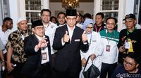 Gaya Anies-Cak Imin Berpeci Jelang Debat Perdana Pilpres 2024
