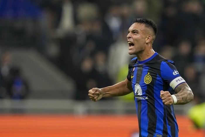 Lautaro Martinez Inter Milan's Lautaro Martinez celebrates at the end of the Serie A soccer match between Inter Milan and Roma at the San Siro Stadium, in Milan, Italy, Sunday, Oct. 29, 2023. (AP Photo/Antonio Calanni)