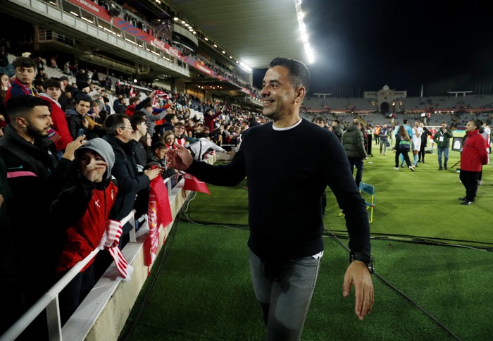 Soccer Football - LaLiga - FC Barcelona v Girona - Estadi Olimpic Lluis Companys, Barcelona, Spain - December 10, 2023 Girona coach Michel celebrates with fans after the match REUTERS/Albert Gea