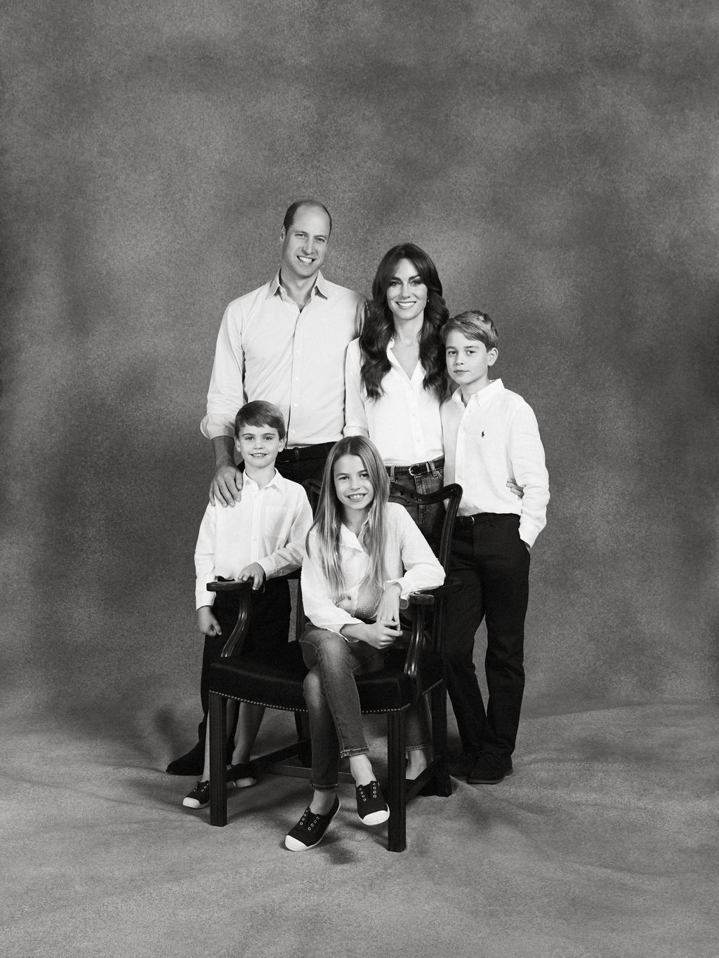 This undated handout photo provided by Kensington Palace show Britain's Prince William and Kate, Princess of Wales with their three children Prince George, Princess Charlotte and Prince Louis, in a photograph that features on the family's 2023 Christmas card. (Josh Shinner/Kensington Palace via AP)