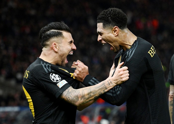 Soccer Football - Champions League - Group C - 1. FC Union Berlin v Real Madrid - Olympiastadion, Berlin, Germany - December 12, 2023 Real Madrids Dani Ceballos celebrates scoring their third goal with Jude Bellingham REUTERS/Annegret Hilse