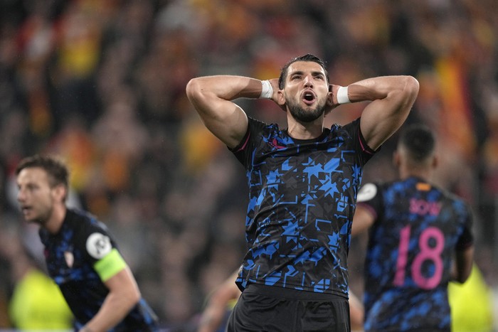 Sevillas Rafa Mir reacts during the Champions League Group B soccer match between Lens and Sevilla at the Bollaert stadium in Lens, France, Tuesday, Dec. 12, 2023. (AP Photo/Thibault Camus)